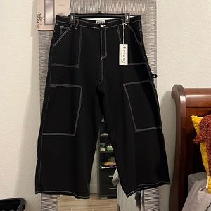 Run! I only have 3 pair of these black denim extra wide leg stretch cargos!